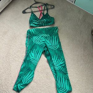 It’s a green work out set with a floral pattern.